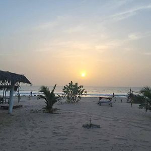 Jusula Beach Resort Sanyang Exterior photo