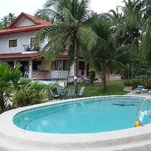 Las Flores Beachside Hotel Catmon Exterior photo